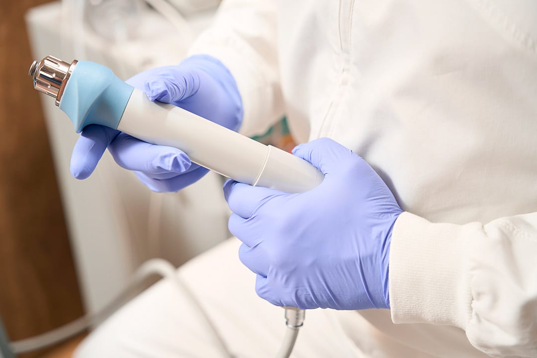 health professional using IV Laser therapy machine