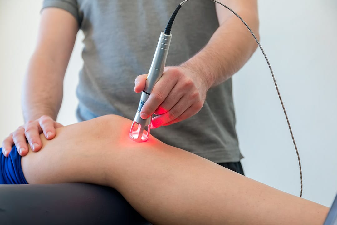 iv laser therapy over knee and leg.